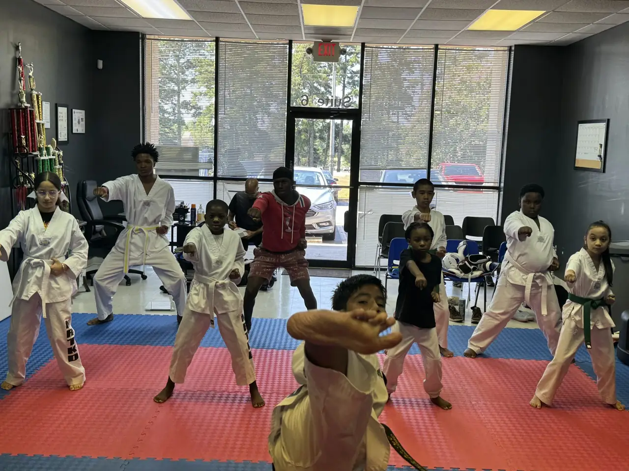 Taekwondo students training together in Riverdale